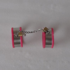 Яскраво-рожеві наручники з нержавіючої сталі та силікону із замком. photo 2